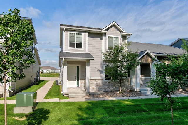 427 Spring Crest Ln, Waukee, IA 50263 - craftsman house with stone siding and a front yard