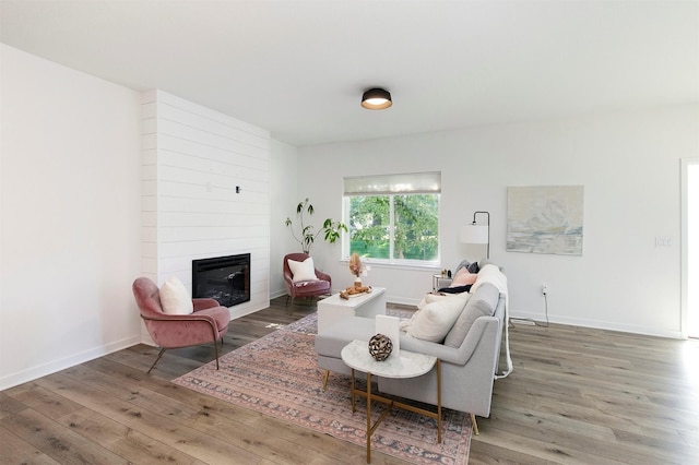 427 Spring Crest Ln, Waukee, IA 50263 - living room with wood-type flooring and a fireplace