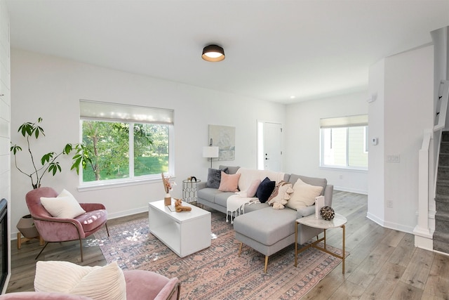 427 Spring Crest Ln, Waukee, IA 50263 - living area featuring wood finished floors and stairs