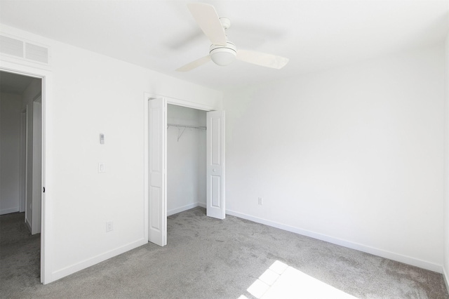 427 Spring Crest Ln, Waukee, IA 50263 - unfurnished bedroom with carpet floors, a closet, and a ceiling fan