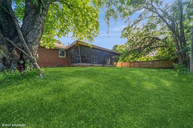 7012 Sunrise Blvd, Windsor Heights, IA 50324 - view of yard featuring a sunroom