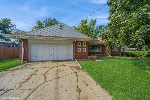 7012 Sunrise Blvd, Windsor Heights, IA 50324 - view of front of property featuring concrete driveway, brick siding, and a garage