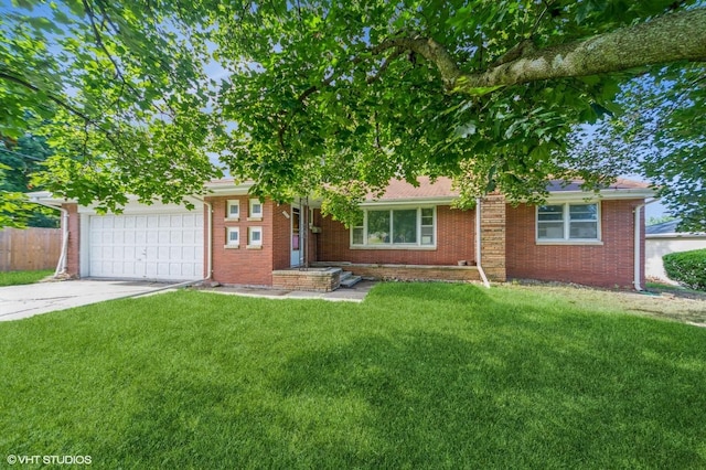 7012 Sunrise Blvd, Windsor Heights, IA 50324 - view of front of house featuring concrete driveway, a garage, and brick siding