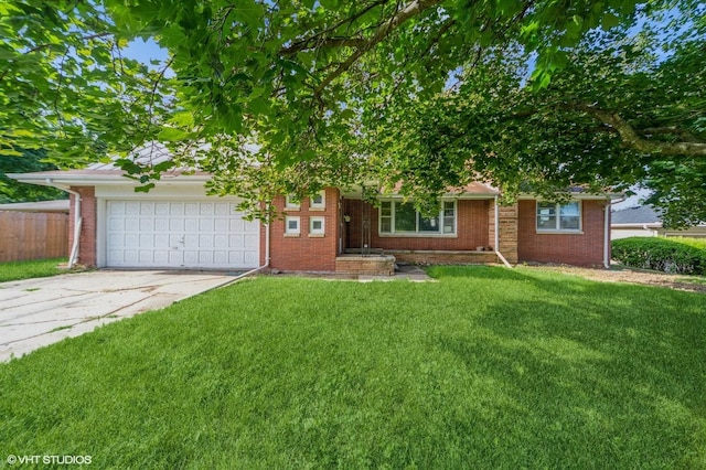 7012 Sunrise Blvd, Windsor Heights, IA 50324 - obstructed view of property with concrete driveway, a garage, and brick siding