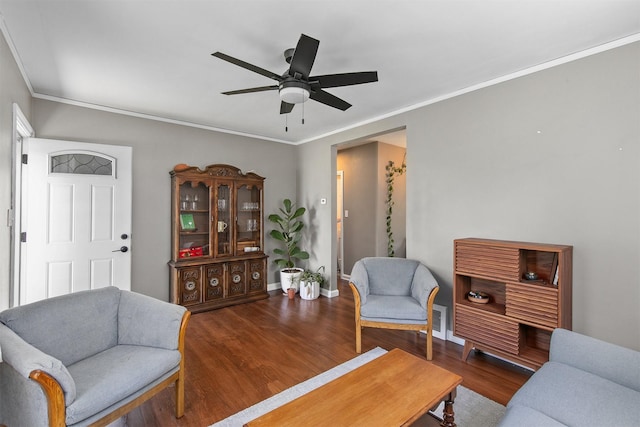 3315 61st St, Des Moines, IA 50322 - living area with ceiling fan, wood finished floors, and crown molding