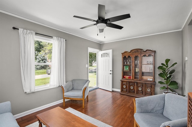 3315 61st St, Des Moines, IA 50322 - sitting room with wood finished floors, plenty of natural light, a ceiling fan, and crown molding