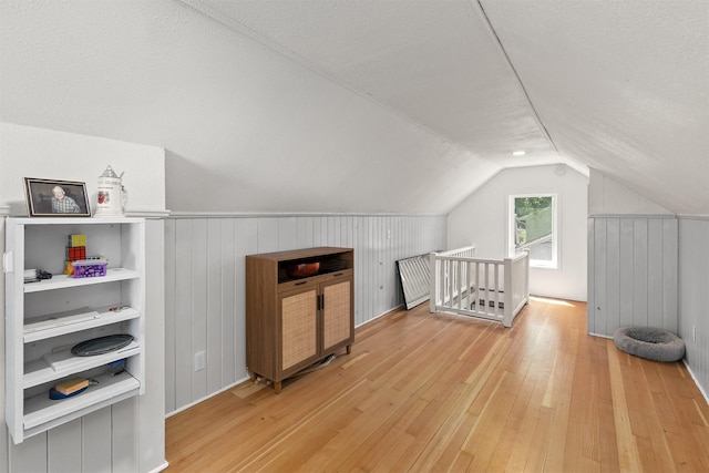 3315 61st St, Des Moines, IA 50322 - bonus room with light wood-type flooring and vaulted ceiling