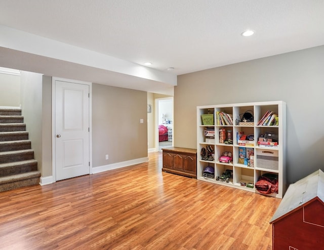 929 Sampson Dr, Nevada, IA 50201 - recreation room with light wood-style flooring and recessed lighting