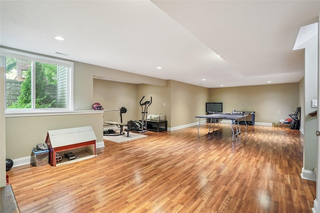 929 Sampson Dr, Nevada, IA 50201 - recreation room with light wood-style flooring, recessed lighting, and an office area
