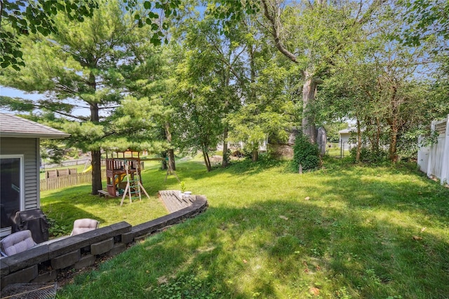 929 Sampson Dr, Nevada, IA 50201 - view of yard with a playground