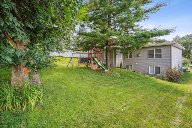929 Sampson Dr, Nevada, IA 50201 - view of yard featuring a playground