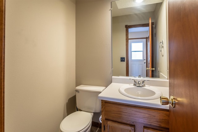 4624 Tamara Ln, West Des Moines, IA 50265 - bathroom with vanity and a textured wall