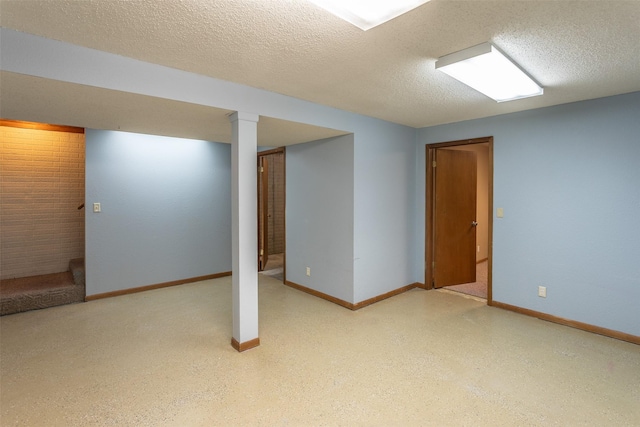 4624 Tamara Ln, West Des Moines, IA 50265 - finished below grade area featuring a textured ceiling and baseboards