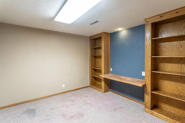 4624 Tamara Ln, West Des Moines, IA 50265 - unfurnished bedroom featuring carpet and a textured ceiling