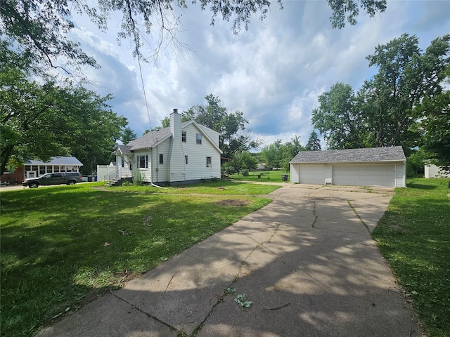 4690 Hubbell Ave, Des Moines, IA 50317 - view of home's exterior featuring an outbuilding, a garage, a chimney, and a yard