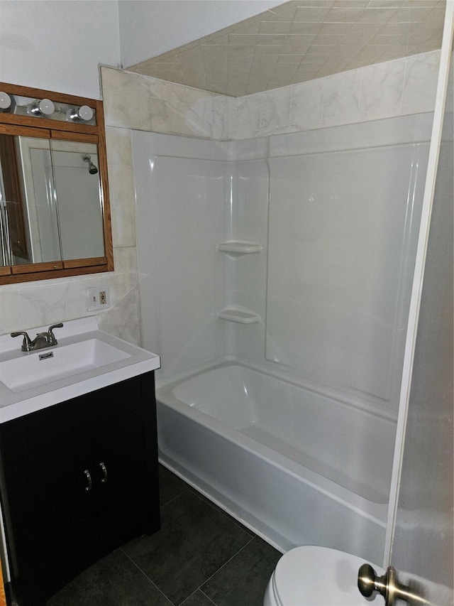 4690 Hubbell Ave, Des Moines, IA 50317 - full bathroom with tile patterned flooring, vanity, and washtub / shower combination