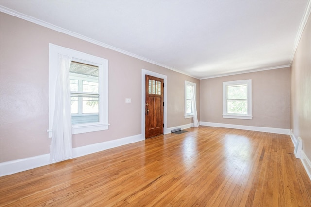 2521 40th St, Des Moines, IA 50310 - foyer featuring ornamental molding and light wood-type flooring