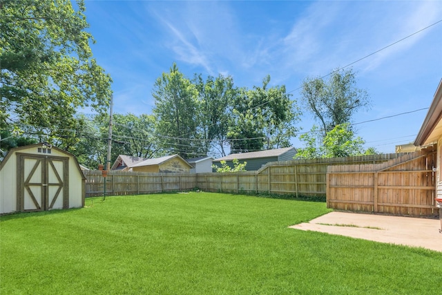2521 40th St, Des Moines, IA 50310 - fenced backyard featuring a storage unit