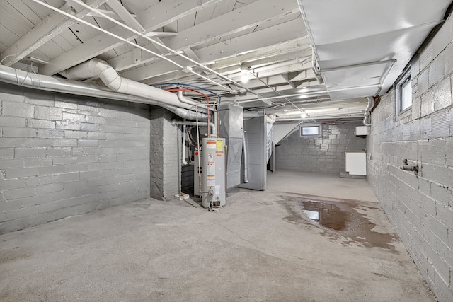 1728 NW Dr, Des Moines, IA 50310 - basement with water heater