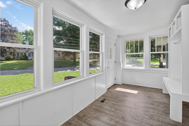 1728 NW Dr, Des Moines, IA 50310 - unfurnished sunroom featuring wood finished floors