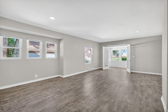 1728 NW Dr, Des Moines, IA 50310 - spare room featuring dark wood-style floors and recessed lighting