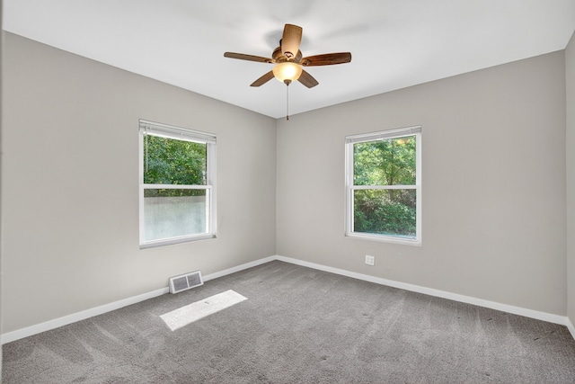 1728 NW Dr, Des Moines, IA 50310 - carpeted spare room featuring healthy amount of natural light and ceiling fan