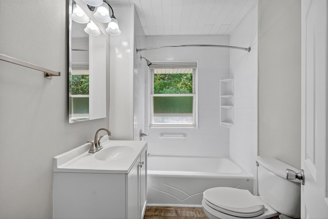 1728 NW Dr, Des Moines, IA 50310 - full bath with vanity, shower / washtub combination, and wood finished floors