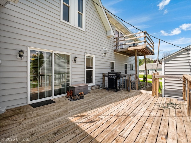 623 N Main St, Stuart, IA 50250 - wooden terrace featuring grilling area