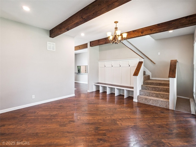 623 N Main St, Stuart, IA 50250 - unfurnished living room with a chandelier, wood finished floors, recessed lighting, stairway, and beamed ceiling