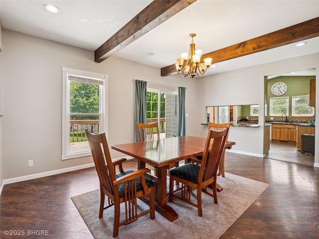 623 N Main St, Stuart, IA 50250 - dining area featuring healthy amount of natural light, a chandelier, recessed lighting, beamed ceiling, and dark wood-style flooring