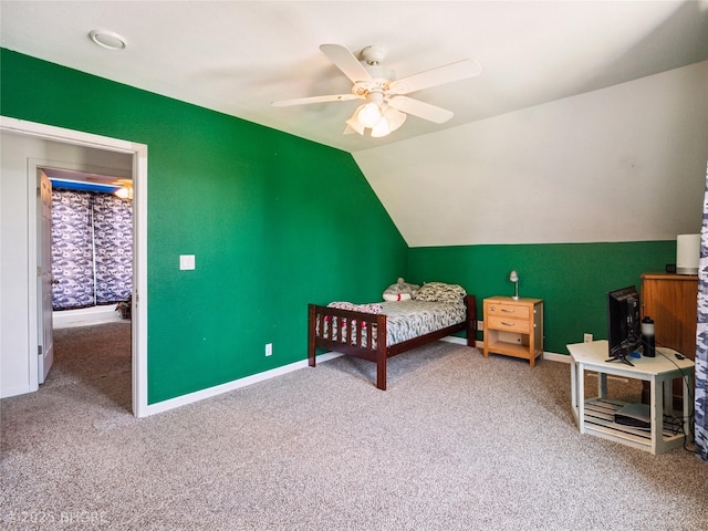 623 N Main St, Stuart, IA 50250 - bedroom with carpet floors, lofted ceiling, and ceiling fan