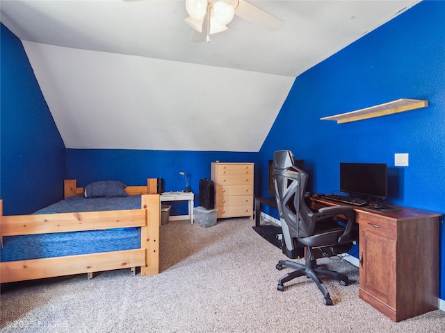 623 N Main St, Stuart, IA 50250 - bedroom with carpet floors, vaulted ceiling, a ceiling fan, and a desk
