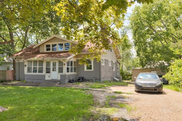 1118 Euclid Ave, Des Moines, IA 50313 - view of front of home with entry steps, a shingled roof, and driveway