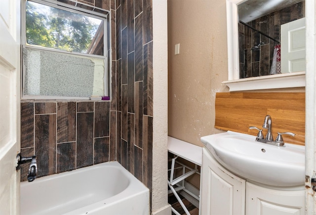 1118 Euclid Ave, Des Moines, IA 50313 - full bathroom featuring vanity and a textured wall
