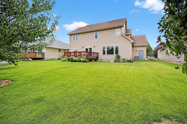 4309 129th St, Urbandale, IA 50323 - rear view of property with a deck and a yard