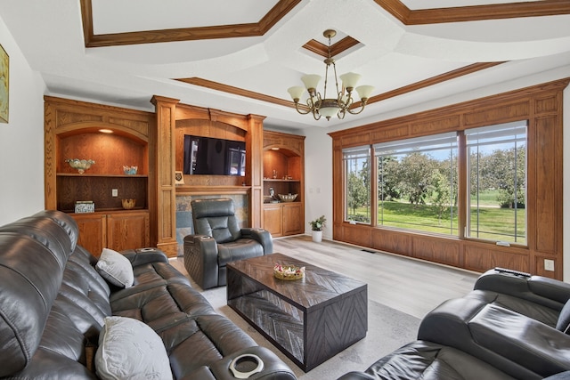 4309 129th St, Urbandale, IA 50323 - living area featuring coffered ceiling, a chandelier, a premium fireplace, and light wood finished floors