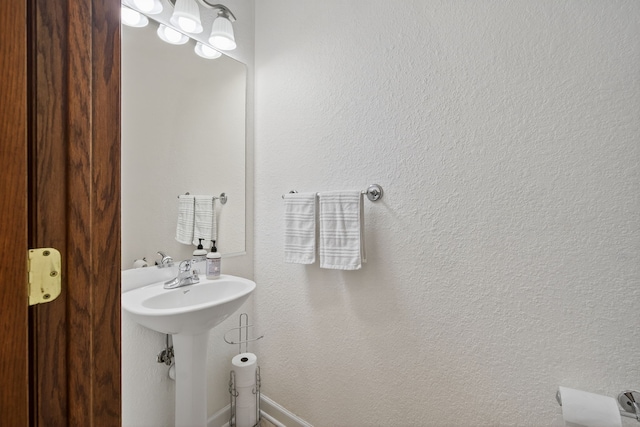 4309 129th St, Urbandale, IA 50323 - bathroom featuring baseboards