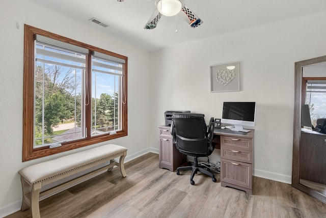 4309 129th St, Urbandale, IA 50323 - office area with light wood-style floors and a ceiling fan