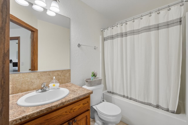4309 129th St, Urbandale, IA 50323 - full bathroom featuring tasteful backsplash, vanity, shower / bath combo with shower curtain, and a textured wall