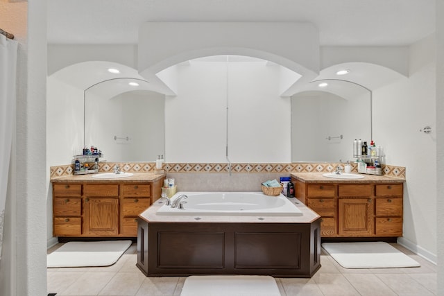 4309 129th St, Urbandale, IA 50323 - full bathroom featuring tile patterned flooring, two vanities, and a whirlpool tub