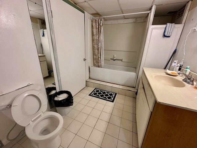 3923 15th St, Des Moines, IA 50313 - bathroom with vanity, tile patterned flooring, shower / bath combination with curtain, and a drop ceiling