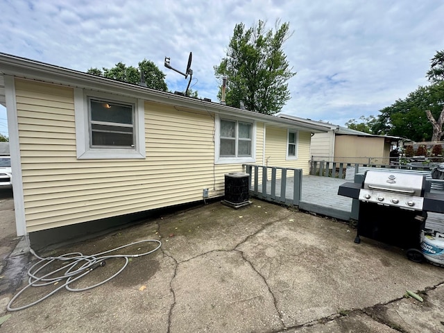 3923 15th St, Des Moines, IA 50313 - view of patio featuring grilling area and a wooden deck
