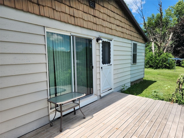 503 Main St, Harvey, IA 50119 - deck featuring a yard