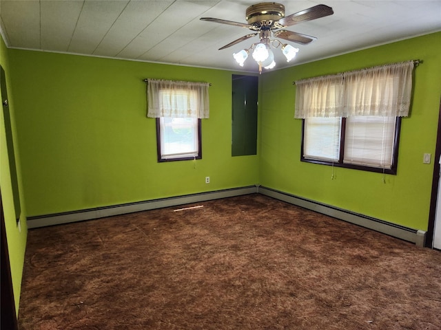 503 Main St, Harvey, IA 50119 - unfurnished room featuring carpet floors, a ceiling fan, and baseboard heating
