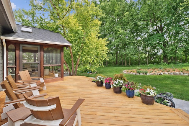 7016 Harbour Dr, Johnston, IA 50131 - deck with a sunroom, a yard, and view of wooded area