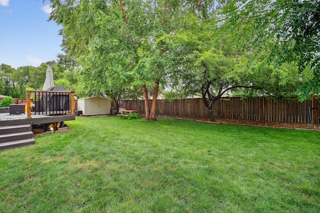 4808 Dewey Pl, Johnston, IA 50131 - fenced backyard featuring a storage shed and a wooden deck