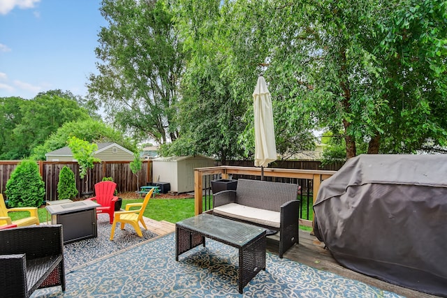 4808 Dewey Pl, Johnston, IA 50131 - fenced backyard featuring outdoor lounge area, a shed, a deck, and grilling area