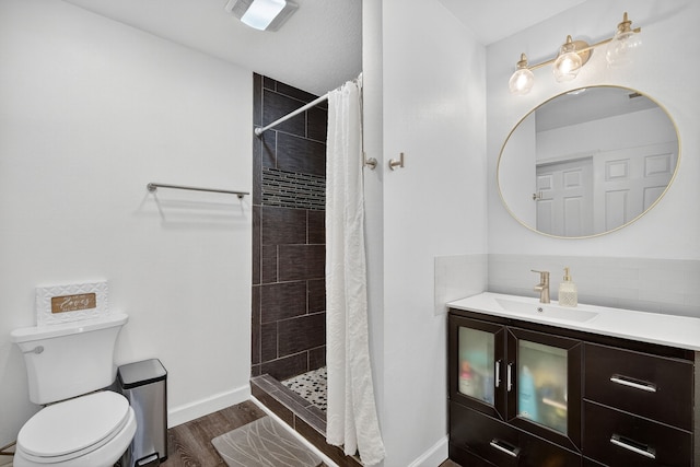 4808 Dewey Pl, Johnston, IA 50131 - bathroom with vanity, wood finished floors, and a tile shower