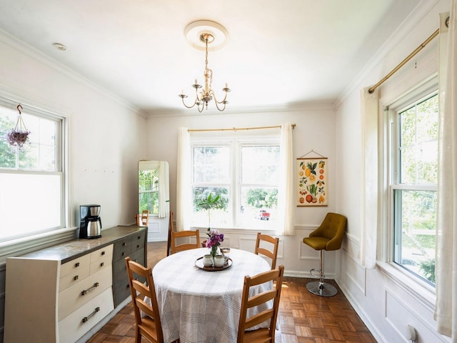 1655 NW Dr, Des Moines, IA 50310 - dining space featuring a chandelier and crown molding