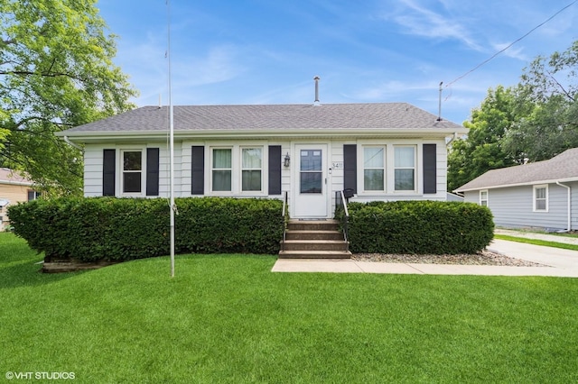 3411 61st St, Des Moines, IA 50322 - view of front of house featuring a front lawn, entry steps, and a shingled roof
